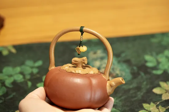 Handcrafted Yixing Clay Teapot | Artisan Pumpkin-shaped Zisha Pot – 180cc 1