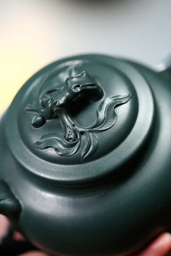 Yixing Zisha Teapot - Peach Spring Design, Handcrafted Ceramic Artistry 1