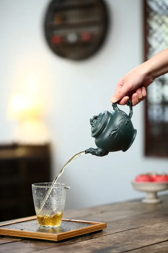 Yixing Zisha Teapot - Peach Spring Design, Handcrafted Ceramic Artistry 5