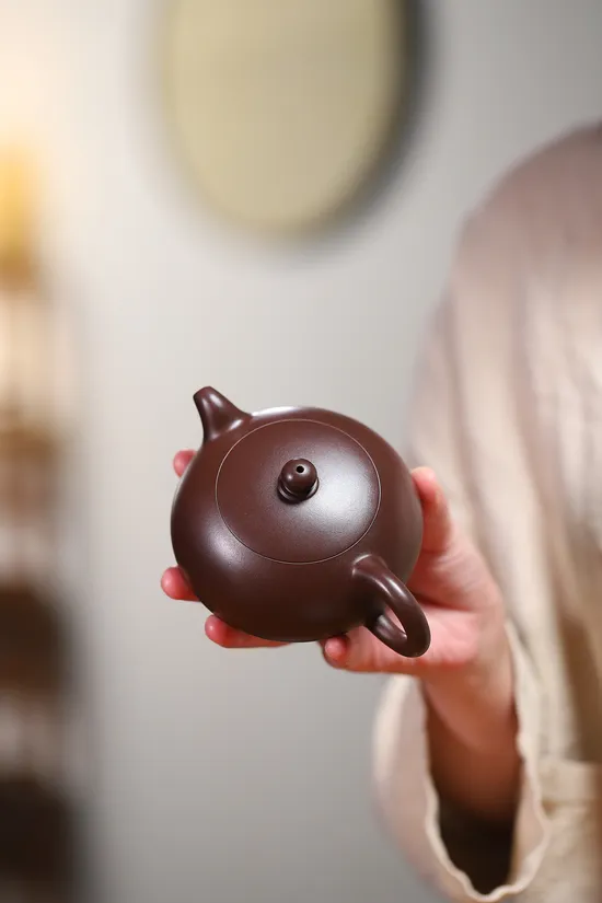 Handcrafted Yixing Purple Clay Half-Moon Teapot - Artisan Craftsmanship 6