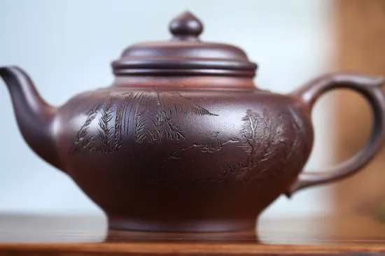Zisha Teapots: red dragon chromatic clay | hexagonal 16-hole spout 1