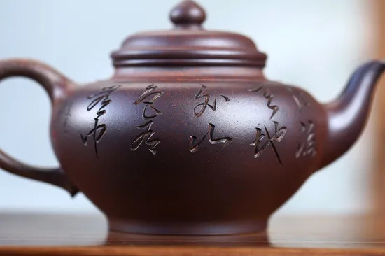 Zisha Teapots: red dragon chromatic clay | hexagonal 16-hole spout 2
