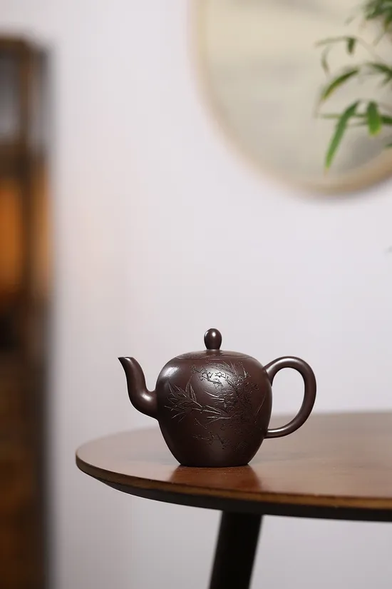 Yixing Zisha Teapot - Mastercrafted Clay Pot with Artistic Engravings 3