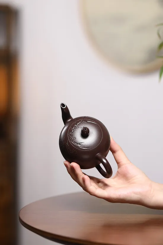 Yixing Zisha Teapot - Mastercrafted Clay Pot with Artistic Engravings 4