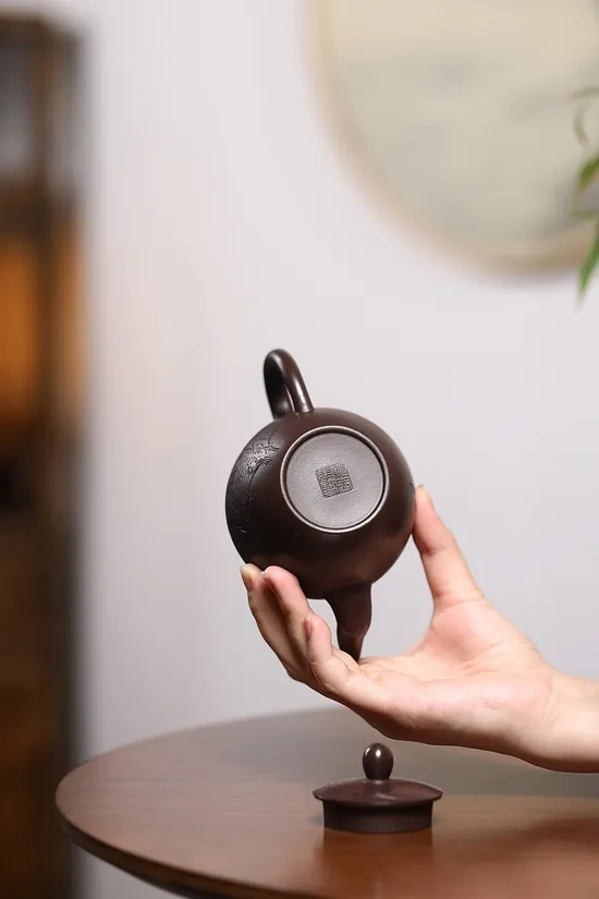 Yixing Zisha Teapot - Mastercrafted Clay Pot with Artistic Engravings 5