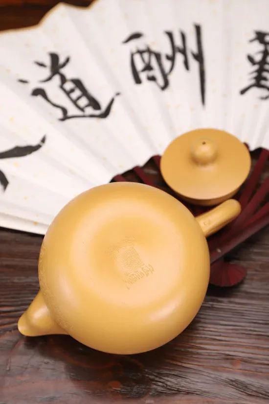 Yixing Teapot | Golden Clay Artisan Craft | Phoenix Design 6