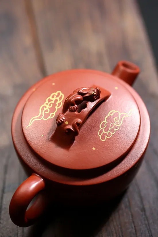Yixing Zisha Teapot - Handcrafted Purple Clay Pot with Golden Patterns 2
