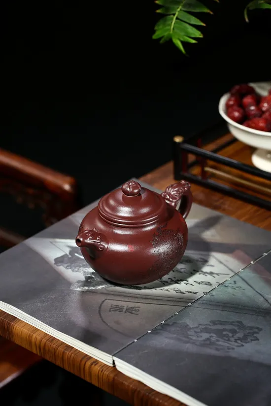 Yixing Zisha Teapot: Handcrafted Purple Clay Dragon-Phoenix Design 1