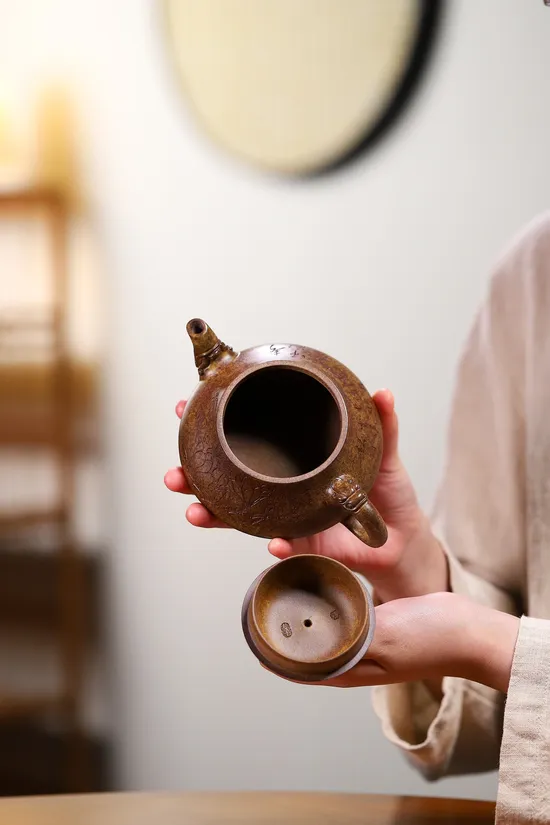 Handcrafted Yixing Golden Clay Dragon Teapot | Artisan Ceramics 3